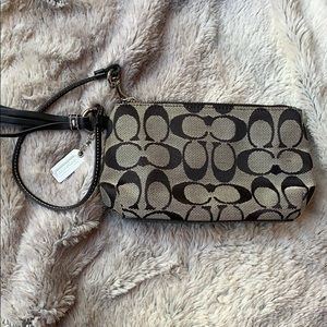 Black and White Cs Coach Wristlet with tassel